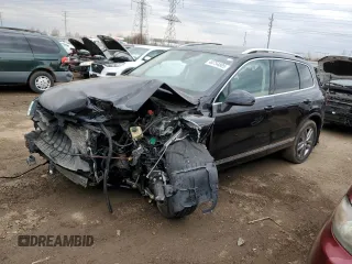 2016 Volkswagen Touareg Sport with VIN WVGEF9BP4GD011455, listed as a Copart auction lot 49734885 with 145,450 mi miles and Salvage Title. Bid and sale history available at DreamBid. Image 1.