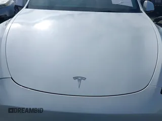 2023 Tesla Model Y Long Range with VIN 7SAYGDEE9PA094191, listed as a IAAI auction lot 41906319 with 15,240 mi miles and . Bid and sale history available at DreamBid. Image 10.