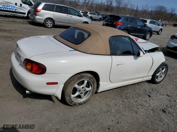 2000 Mazda MX-5 Miata with VIN JM1NB3530Y0140338, listed as a Copart auction lot 49162475 with 73,598 mi miles and Salvage Title. Bid and sale history available at carsss.com. Image 3.