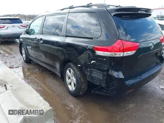 2013 Toyota Sienna LE AAS with VIN 5TDKK3DC8DS401419, listed as a IAAI auction lot 42007146 with 182,651 mi miles. Bid and sale history available at carsss.com. Image 3.