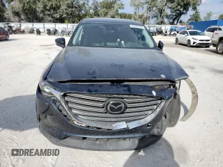 2020 Mazda CX-9 Touring with VIN JM3TCACY0L0421773, listed as a Copart auction lot 58373945 with 106,698 mi miles and Non repairable. Bid and sale history available at DreamBid. Image 5.