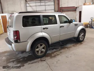 2007 Dodge Nitro SLT with VIN 1D8GU58K97W616455, listed as a IAAI auction lot 41229813 with 199,421 mi miles. Bid and sale history available at carsss.com. Image 4.