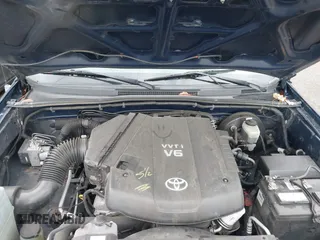 2006 Toyota Tacoma with VIN 5TEUU42N06Z165755, listed as a IAAI auction lot 41619786 with 168,910 mi miles. Bid and sale history available at carsss.com. Image 10.