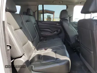2019 Chevrolet Suburban LT z VIN 1GNSKHKC0KR397479, wystawiony jako Copart lot #56206065 z przebiegiem 289 466 mil mil oraz Czysty tytuł • Clean title. Historia ofert i sprzedaży dostępna na DreamBid. Obrazek 11.
