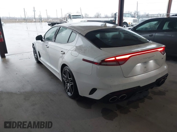 2023 Kia Stinger GT2 with VIN KNAE55LCXP6135128, listed as a IAAI auction lot 41281782 with 6,272 mi miles. Bid and sale history available at carsss.com. Image 3.
