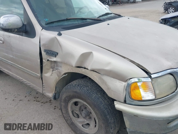 1997 Ford Expedition XLT with VIN 1FMEU1765VLB24163, listed as a IAAI auction lot 42303093 with 137,427 mi miles and . Bid and sale history available at DreamBid. Image 6.