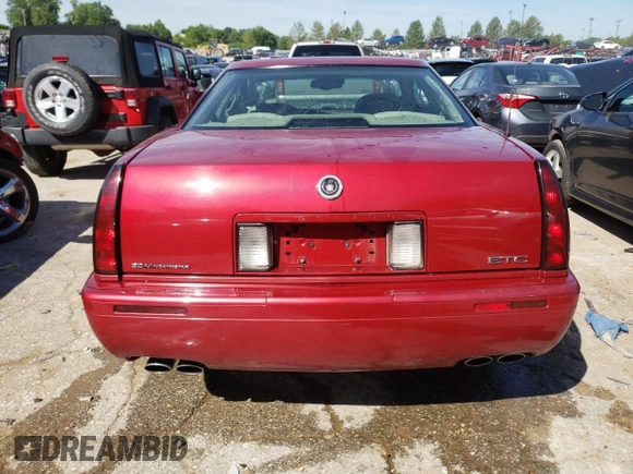 2000 Cadillac Eldorado Touring ETC z VIN 1G6ET129XYU191433, wystawiony jako Copart lot #58108224 z przebiegiem 76 957 mil mil oraz Szkody całkowita. Historia ofert i sprzedaży dostępna na DreamBid. Obrazek 6.