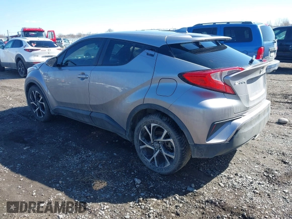 2018 Toyota C-HR XLE with VIN NMTKHMBX4JR035415, listed as a IAAI auction lot 41823751 with 75,566 mi miles. Bid and sale history available at carsss.com. Image 3.