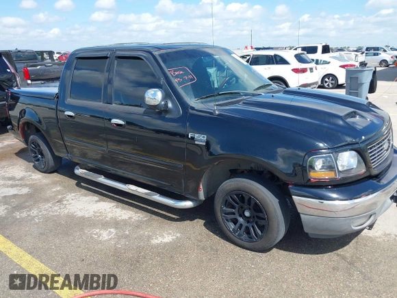 2003 Ford F-150 XLT with VIN 1FTRW07673KD87283, listed as a IAAI auction lot 42687687 with 339,160 mi miles and . Bid and sale history available at DreamBid. Image 1.