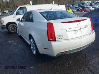 2012 Cadillac CTS Premium with VIN 1G6DP5E3XC0144157, listed as a IAAI auction lot 41311350 with 96,042 mi miles and . Bid and sale history available at DreamBid. Image 3.