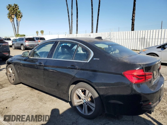 2018 BMW 3 Series 330e iPerformance with VIN WBA8E1C55JA758443, listed as a Copart auction lot 89356485 with 35,599 mi miles and Salvage Title. Bid and sale history available at carsss.com. Image 2.