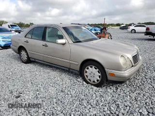 1999 Mercedes-Benz E with VIN WDBJF25H7XA934446, listed as a Copart auction lot 51386255 with 218,439 mi miles and Clean Title. Bid and sale history available at DreamBid. Image 4.