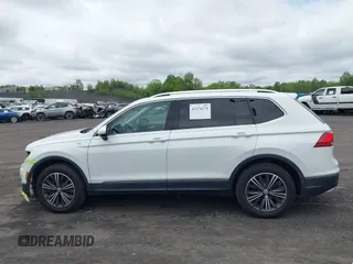 2018 Volkswagen Tiguan SEL with VIN 3VV2B7AX7JM099570, listed as a IAAI auction lot 42374274 with 87,838 mi miles and . Bid and sale history available at DreamBid. Image 14.
