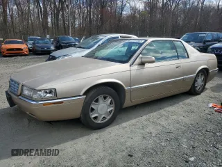 1998 Cadillac Eldorado z VIN 1G6EL12Y1WU607194, wystawiony jako Copart lot #49990665 z przebiegiem Nie podano mil oraz Szkoda całkowita • Salvage title. Historia ofert i sprzedaży dostępna na DreamBid. Obrazek 1.