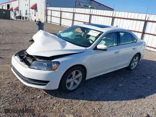 2013 Volkswagen Passat SE w/Sunroof with VIN 1VWBH7A31DC007320, listed as a IAAI auction lot 41213664 with 164,040 mi miles. Bid and sale history available at carsss.com. Image 2.