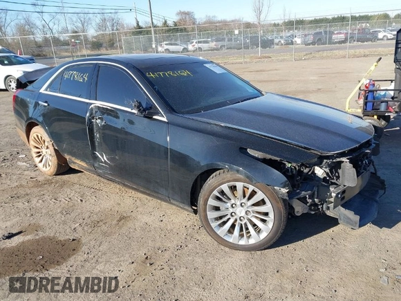 2019 Cadillac CTS Luxury AWD z VIN 1G6AX5SX8K0129858, wystawiony jako IAAI lot #41778164 z przebiegiem 89 695 mil mil oraz . Historia ofert i sprzedaży dostępna na DreamBid. Obrazek 1.