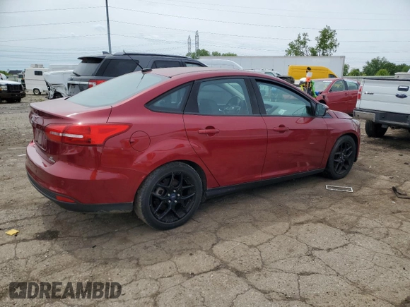 2016 Ford Focus SE with VIN 1FADP3F22GL235697, listed as a Copart auction lot 59081445 with Not provided miles and Clean title. Bid and sale history available at DreamBid. Image 3.