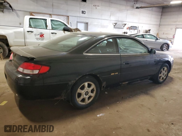 1999 Toyota Solara SE z VIN 2T1CF22P5XC230117, wystawiony jako Copart lot #57488925 z przebiegiem 282 366 mil mil oraz Czysty tytuł • Clean title. Historia ofert i sprzedaży dostępna na DreamBid. Obrazek 3.