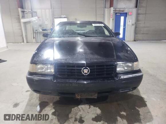 2000 Cadillac Eldorado Touring ETC z VIN 1G6ET1294YU144883, wystawiony jako Copart lot #80979854 z przebiegiem 89 271 mil mil oraz Czysty tytuł • Clean title. Historia ofert i sprzedaży dostępna na DreamBid. Obrazek 5.
