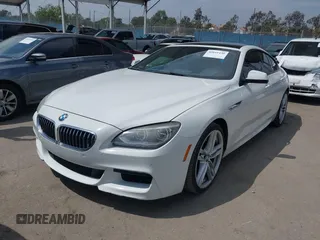 2015 BMW 6 Series 640i with VIN WBA6A0C56FD318007, listed as a IAAI auction lot 42041430 with 78,281 mi miles. Bid and sale history available at carsss.com. Image 2.
