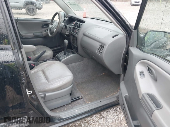 2004 Chevrolet Tracker ZR2 with VIN 2CNBJ734646907924, listed as a IAAI auction lot 42088809 with 98,797 mi miles and . Bid and sale history available at DreamBid. Image 5.