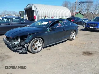 2019 Audi A5 Premium Plus with VIN WAUTNAF54KA026957, listed as a IAAI auction lot 41744015 with 94,506 mi miles and . Bid and sale history available at DreamBid. Image 17.