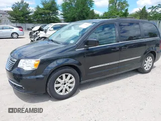 2014 Chrysler Town & Country Touring with VIN 2C4RC1BG2ER206979, listed as a IAAI auction lot 42200266 with 217,610 mi miles and . Bid and sale history available at DreamBid. Image 2.