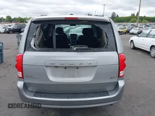 2016 Dodge Grand Caravan SXT with VIN 2C4RDGCG0GR177886, listed as a IAAI auction lot 42138184 with 151,696 mi miles. Bid and sale history available at carsss.com. Image 16.