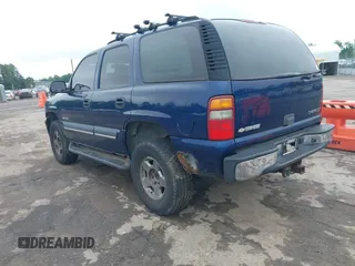 2003 Chevrolet Tahoe LS z VIN 1GNEK13T73J244424, wystawiony jako IAAI lot #42284777 z przebiegiem 233 833 mil mil oraz . Historia ofert i sprzedaży dostępna na DreamBid. Obrazek 3.