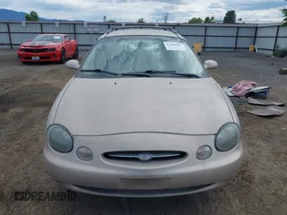1998 Ford Taurus with VIN 1FAFP57U8WG275844, listed as a IAAI auction lot 42426107 with 318,654 mi miles and . Bid and sale history available at DreamBid. Image 12.