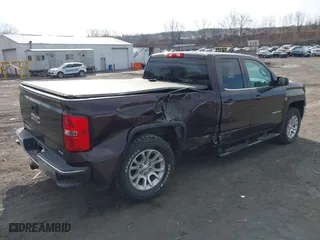 2016 GMC Sierra 1500 SLE with VIN 1GTV2MEC2GZ213838, listed as a IAAI auction lot 41829305 with 62,670 mi miles. Bid and sale history available at carsss.com. Image 4.