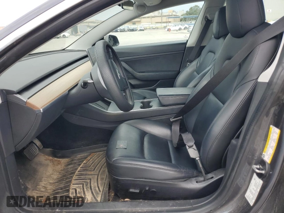 2020 Tesla Model 3 Standard Range Plus z VIN 5YJ3E1EA1LF784832, wystawiony jako Copart lot #57912995 z przebiegiem 77 665 mil mil oraz Szkoda całkowita • Salvage title. Historia ofert i sprzedaży dostępna na DreamBid. Obrazek 7.