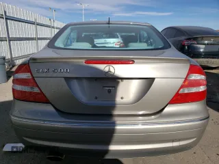 2005 Mercedes-Benz CLK 500 z VIN WDBTJ75J05F159477, wystawiony jako Copart lot #85168664 z przebiegiem 122 295 mil mil oraz Szkody całkowita. Historia ofert i sprzedaży dostępna na DreamBid. Obrazek 6.
