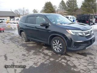 2020 Honda Pilot EX-L z VIN 5FNYF6H50LB022798, wystawiony jako IAAI lot #41592012 z przebiegiem 67 045 mil mil oraz . Historia ofert i sprzedaży dostępna na DreamBid. Obrazek 1.