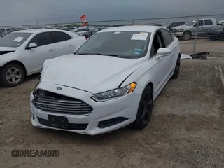 2014 Ford Fusion SE Hybrid with VIN 3FA6P0LU9ER243047, listed as a IAAI auction lot 42417116 with 258,266 mi miles and . Bid and sale history available at DreamBid. Image 2.