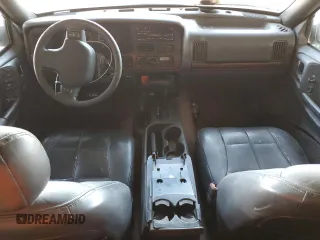 1996 Jeep Grand Cherokee with VIN 1J4EZ78Y9TC104398, listed as a Copart auction lot 69706254 with Not provided miles and Salvage title. Bid and sale history available at DreamBid. Image 8.