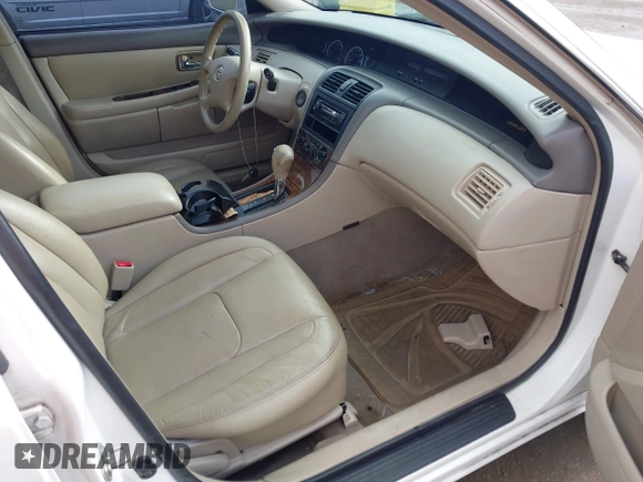 2002 Toyota Avalon XL with VIN 4T1BF28B72U217884, listed as a IAAI auction lot 42145482 with 195,960 mi miles and . Bid and sale history available at DreamBid. Image 5.
