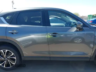 2022 Mazda CX-5 2.5 S Premium Package with VIN JM3KFBDM7N0639118, listed as a IAAI auction lot 41857979 with 15,322 mi miles. Bid and sale history available at carsss.com. Image 13.