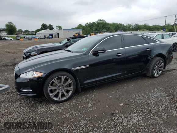 2013 Jaguar XJ Portfolio with VIN SAJWJ2GD0D8V44292, listed as a Copart auction lot 57073775 with 100,458 mi miles and Salvage Title. Bid and sale history available at DreamBid. Image 1.