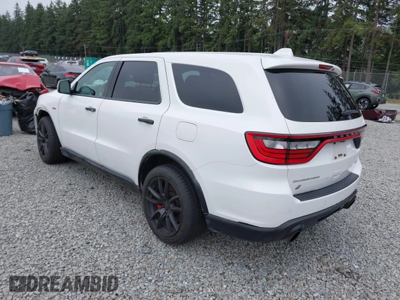 2019 Dodge Durango SRT with VIN 1C4SDJGJ0KC581440, listed as a IAAI auction lot 42473821 with 40,068 mi miles and . Bid and sale history available at DreamBid. Image 3.