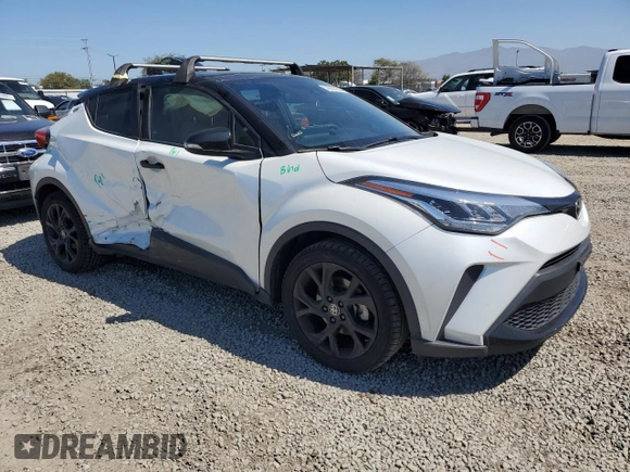 2022 Toyota C-HR XLE with VIN JTNKHMBX4N1130766, listed as a Copart auction lot 50050755 with 119,736 mi miles and Salvage Title. Bid and sale history available at DreamBid. Image 4.