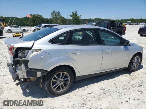 2017 Ford Focus SE with VIN 1FADP3F27HL223918, listed as a Copart auction lot 57464685 with 134,253 mi miles and Salvage title. Bid and sale history available at DreamBid. Image 3.