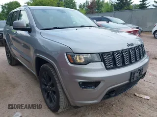 2019 Jeep Grand Cherokee Laredo E with VIN 1C4RJFAG3KC674406, listed as a IAAI auction lot 42389320 with 92,368 mi miles and . Bid and sale history available at DreamBid. Image 1.