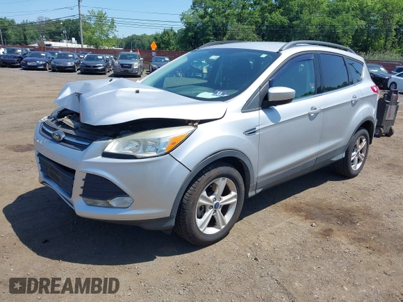 2014 Ford Escape SE with VIN 1FMCU9GX8EUA88526, listed as a IAAI auction lot 42578612 with 22,623 mi miles and . Bid and sale history available at DreamBid. Image 2.