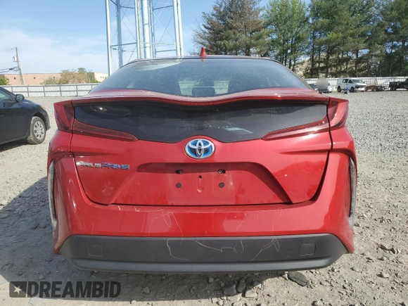 2021 Toyota Prius LE z VIN JTDKAMFP2M3182323, wystawiony jako Copart lot #54396715 z przebiegiem 68 525 mil mil oraz Szkoda całkowita • Salvage title. Historia ofert i sprzedaży dostępna na DreamBid. Obrazek 6.