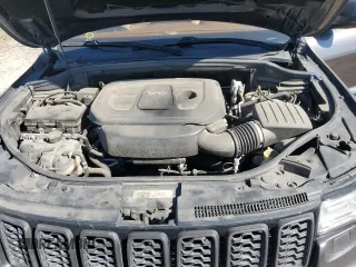 2019 Jeep Grand Cherokee Summit with VIN 1C4RJFJGXKC655979, listed as a Copart auction lot 73033194 with 121,720 mi miles and Salvage title. Bid and sale history available at DreamBid. Image 11.