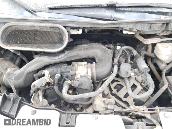 2022 Ford Transit Cargo with VIN 1FTYE1Y82NKA32948, listed as a Copart auction lot 77565844 with 133,959 mi miles and Salvage title. Bid and sale history available at DreamBid. Image 12.