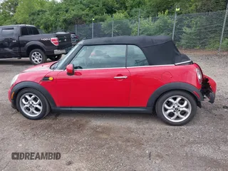 2011 MINI Convertible with VIN WMWZN3C59BTZ89447, listed as a IAAI auction lot 42313009 with 62,009 mi miles and . Bid and sale history available at DreamBid. Image 15.