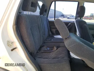 1999 Honda CR-V LX with VIN JHLRD2847XC019705, listed as a Copart auction lot 52220675 with 236,219 mi miles and Salvage Title. Bid and sale history available at carsss.com. Image 11.