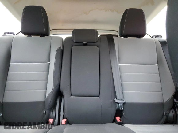 2014 Ford Escape SE with VIN 1FMCU9GX8EUC48467, listed as a Copart auction lot 57269155 with 148,611 mi miles and Salvage title. Bid and sale history available at DreamBid. Image 10.